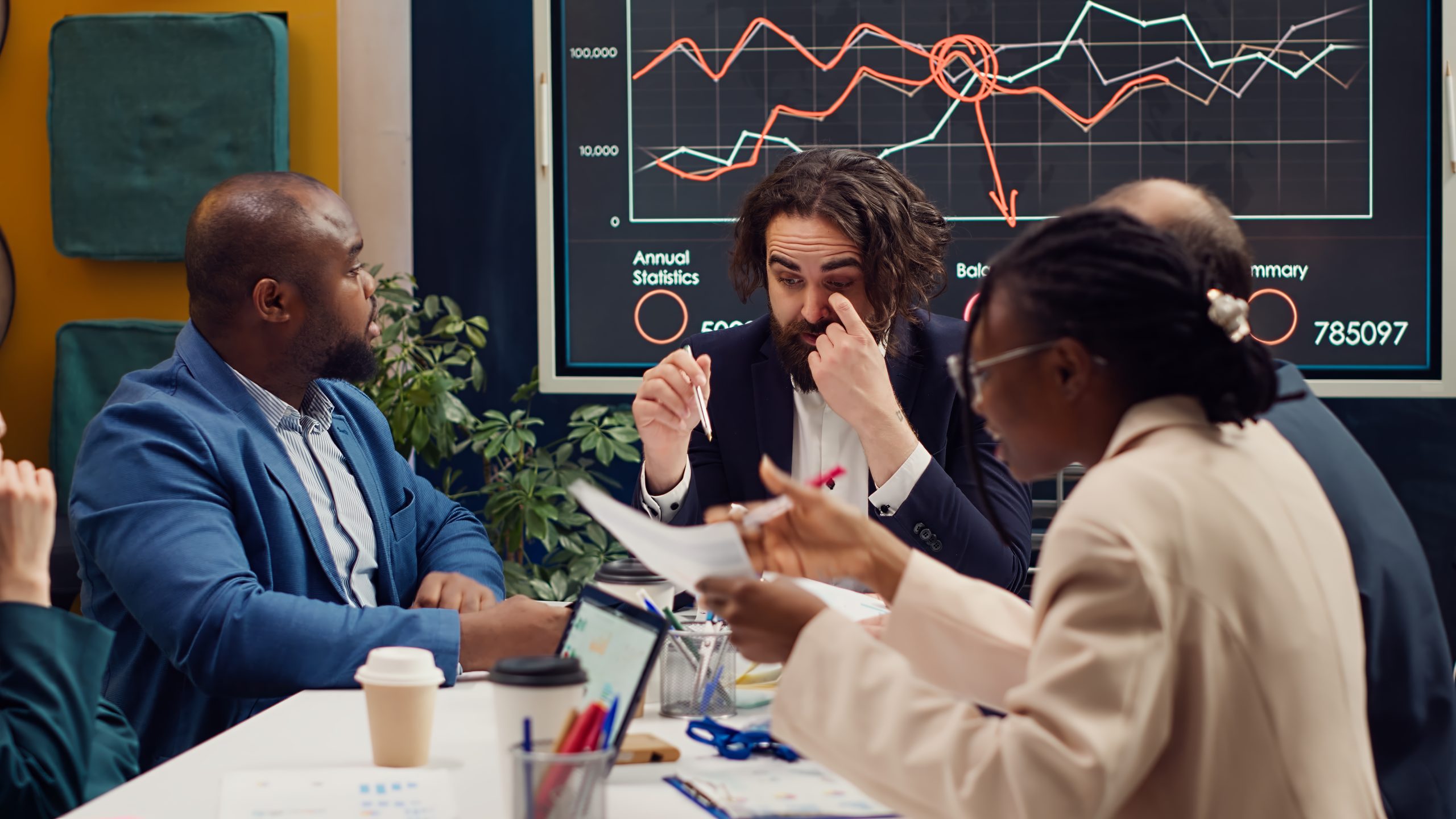 coworkers addressing innovation initiatives in research and development efforts